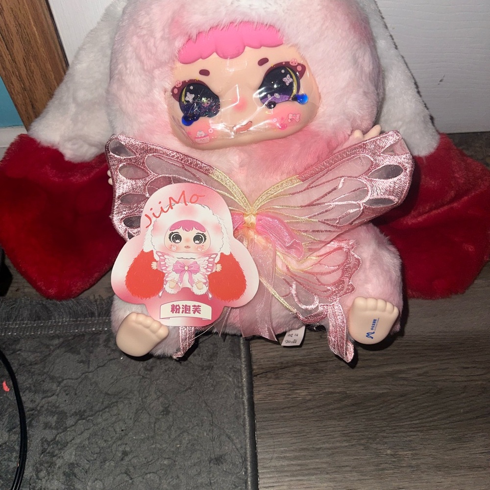 Plush Toy with Red and Pink Accents